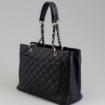 A black caviar "Shopper tote bag" by Chanel 2017.