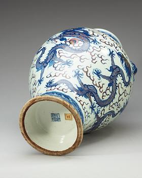 A large blue and white and red dragon vase, Qing dynasty, with Qianlong seal mark.