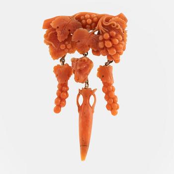 Carved coral brooch. Most likely Italy.