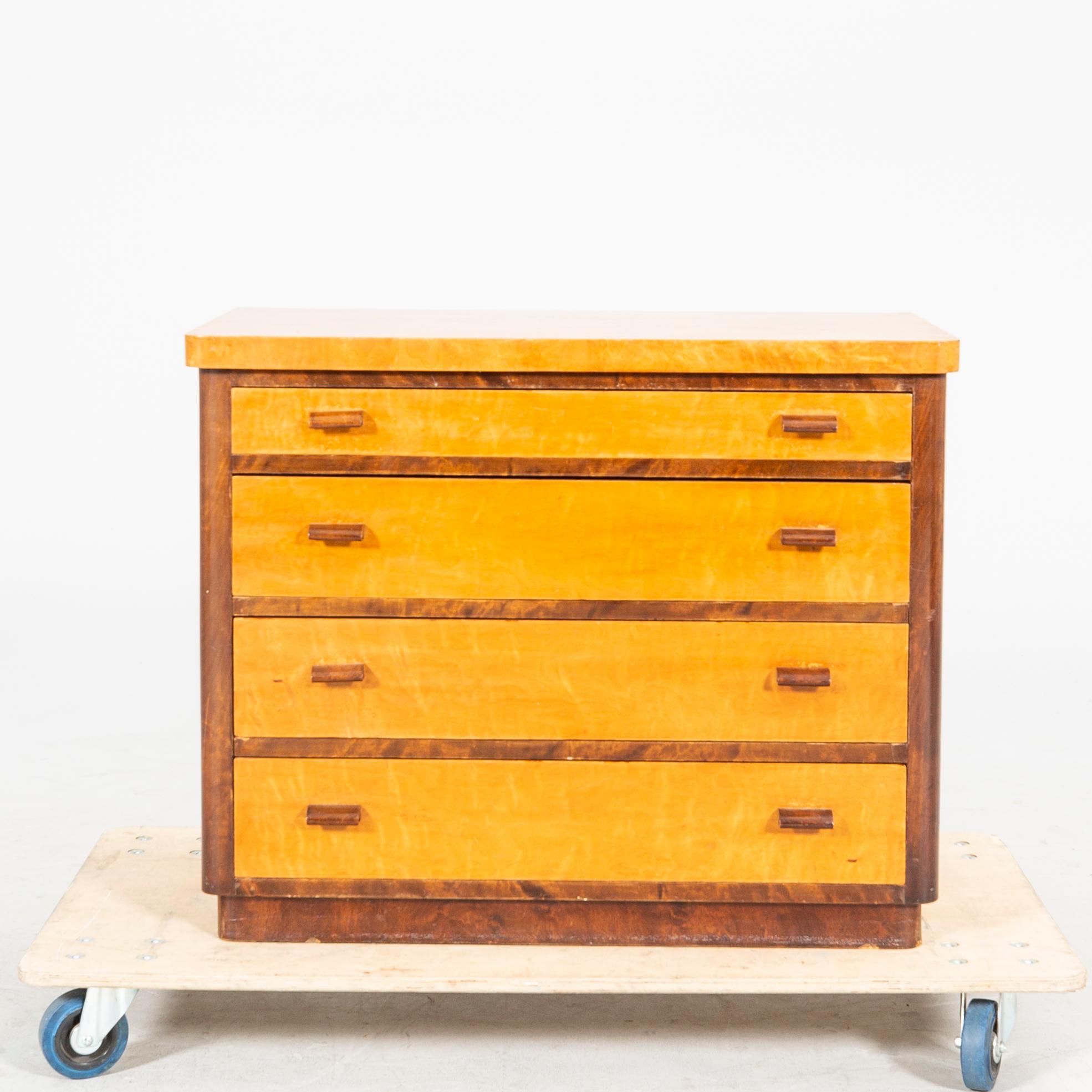 A 1940s Art Deco birch dresser.