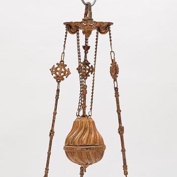 A ceiling carosene lamp, circa 1900.