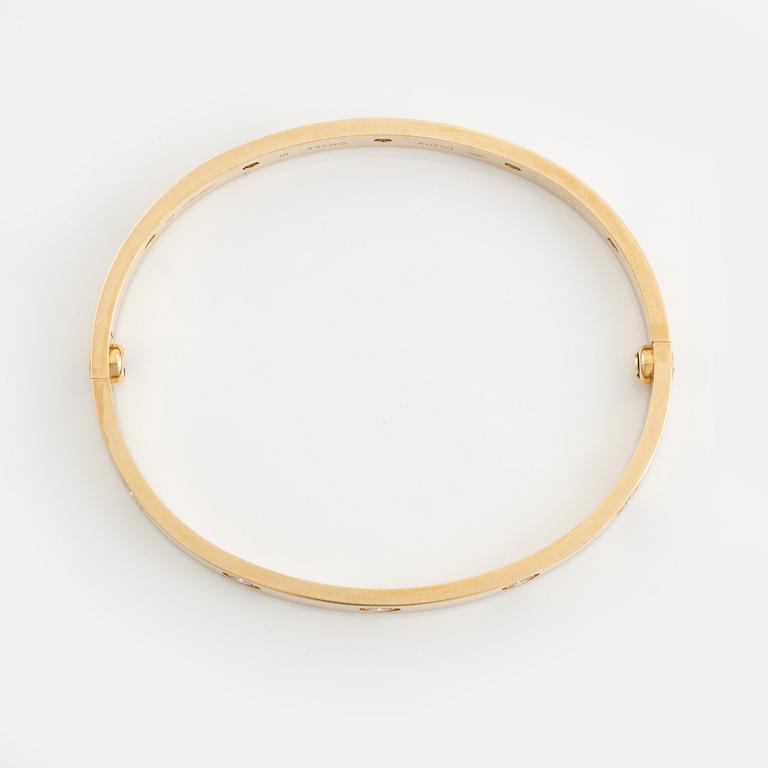 Cartier "Love" armband 18K guld med tio runda briljantslipade diamanter.