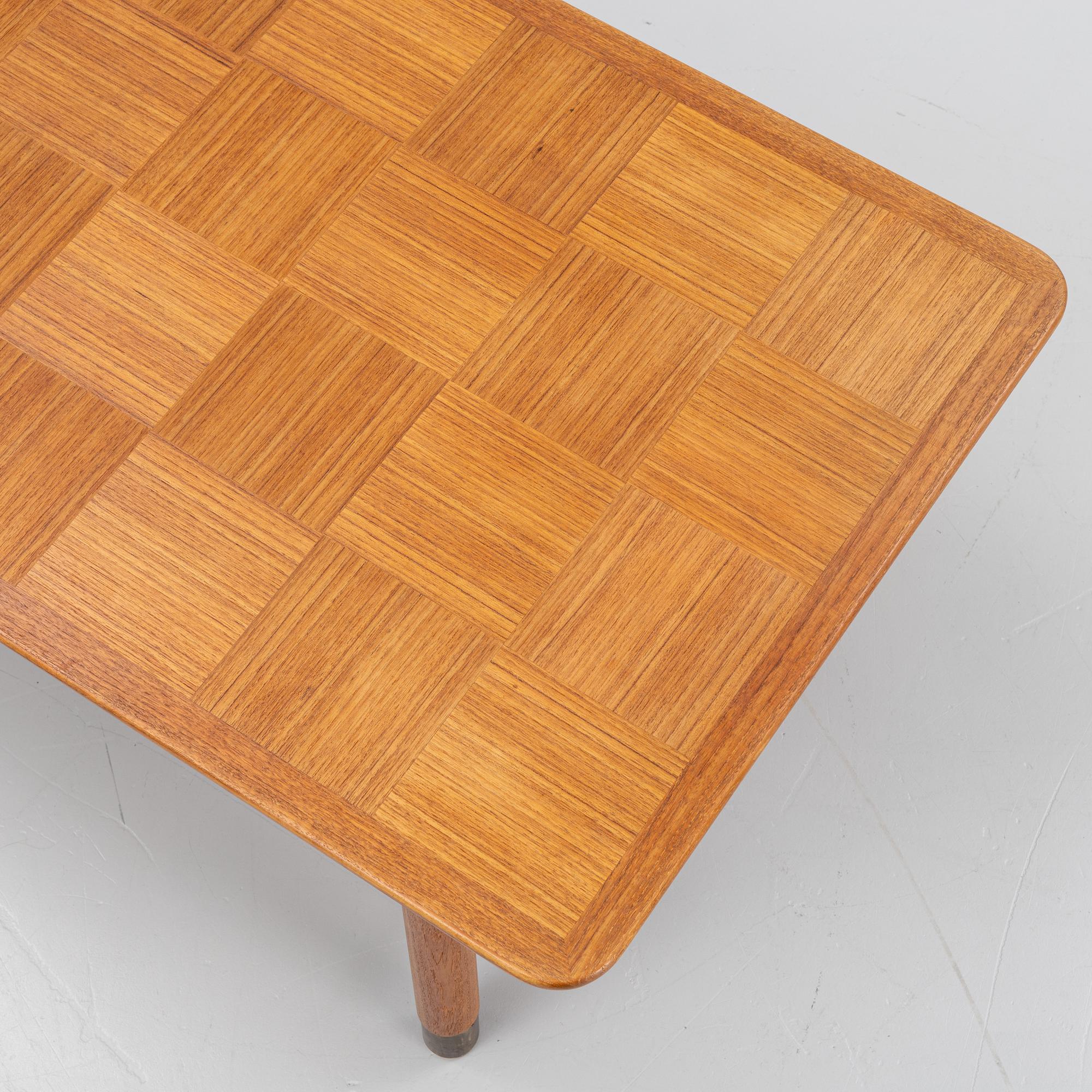 A Teak Veneer Coffee Table, mid 20th century.