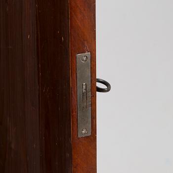 A mahogany veneered cabinet from around year 1900.