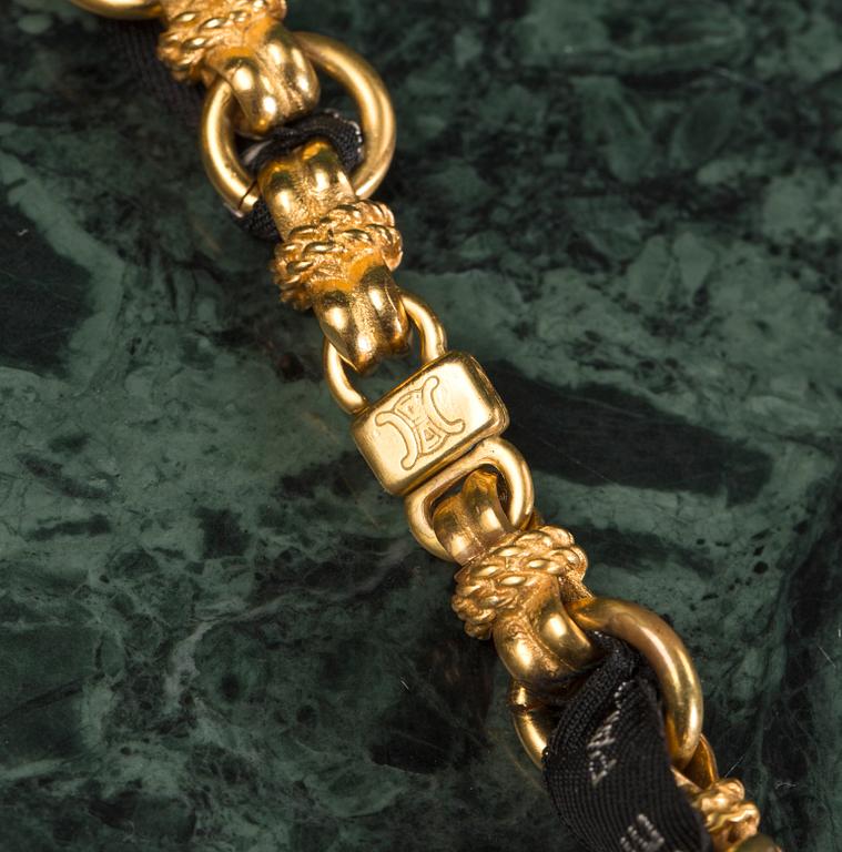 A necklace by CÉLINE.