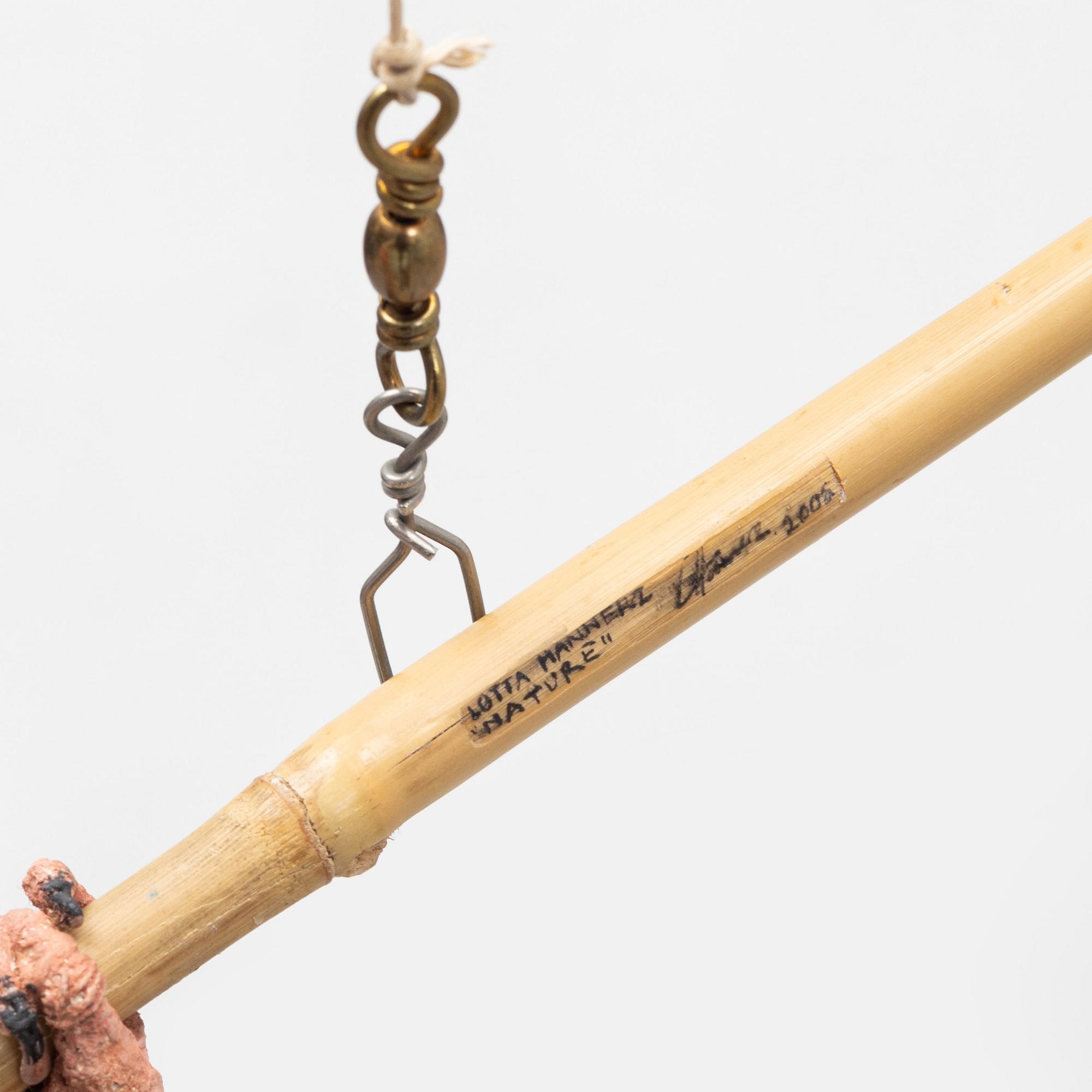 Lotta Hannerz, mixed media, (stuffed pigeon & bamboo stick), 2005.