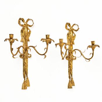 A pair of gilt bronze two-branch appliques after F. L. Rung, late 19th century,