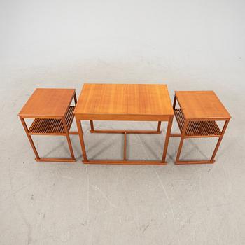 A cherry "the sled" table by Carl Malmsten from the second half of the 20th century.