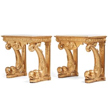 A pair of Swedish Empire carved and giltwood console tables, first half of the 19th century.