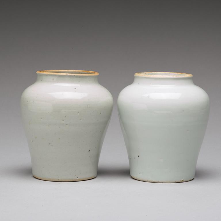 Two white glazed pots, Transiton, 17th Century.