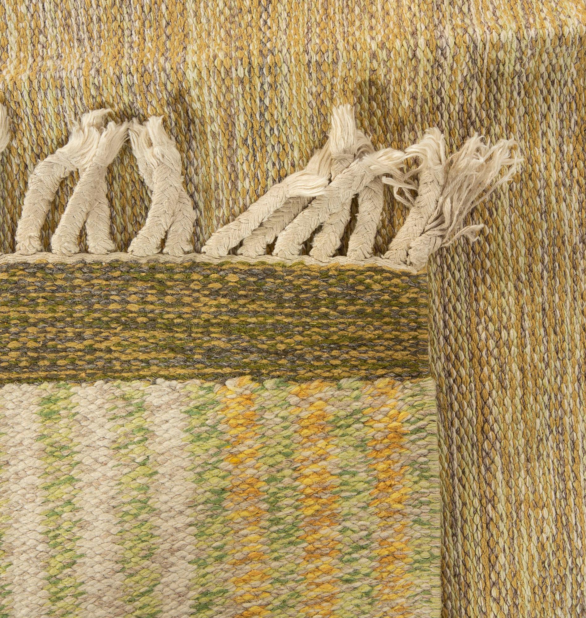 A Scandinanvian flat weave carpet ca 242 x 120 cm.