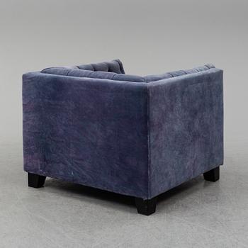 A velvet covered easy chair, 2010.