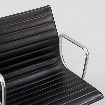 An EA 108 swivel office chair by Charles and Ray Eames for Vitra.