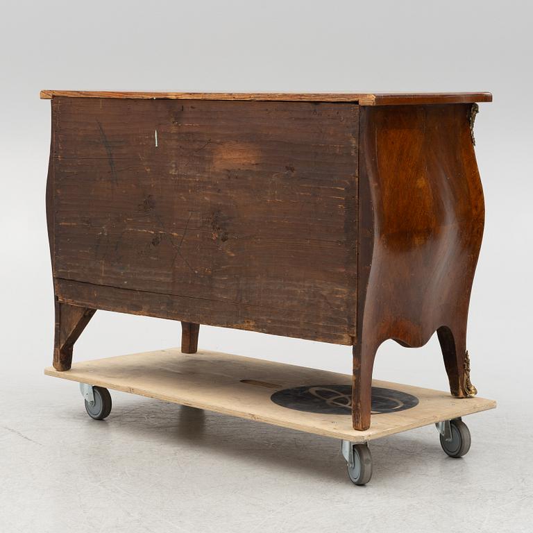 A Rococo chest of drawers, 18th Century.
