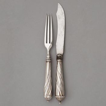 A set of twenty 18th century silver knifes and forks, unidentified marks.