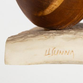 Lars Levi Sunna, sculpture, birch and renideer horn, signed LL Sunna.