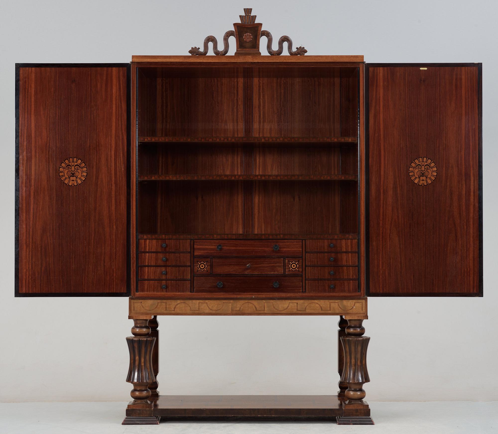 A Gösta Thorell Swedish Grace cabinet in stained birch, palisander, mahogany and other wood inlays, Stockholm 1930.