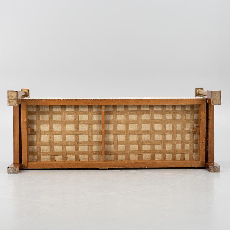 An Empire sofa, first half of the 19th century.