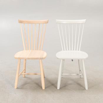A set of two Carl Malmsten "Lilla Åland" chairs from Stolab, contemporary.