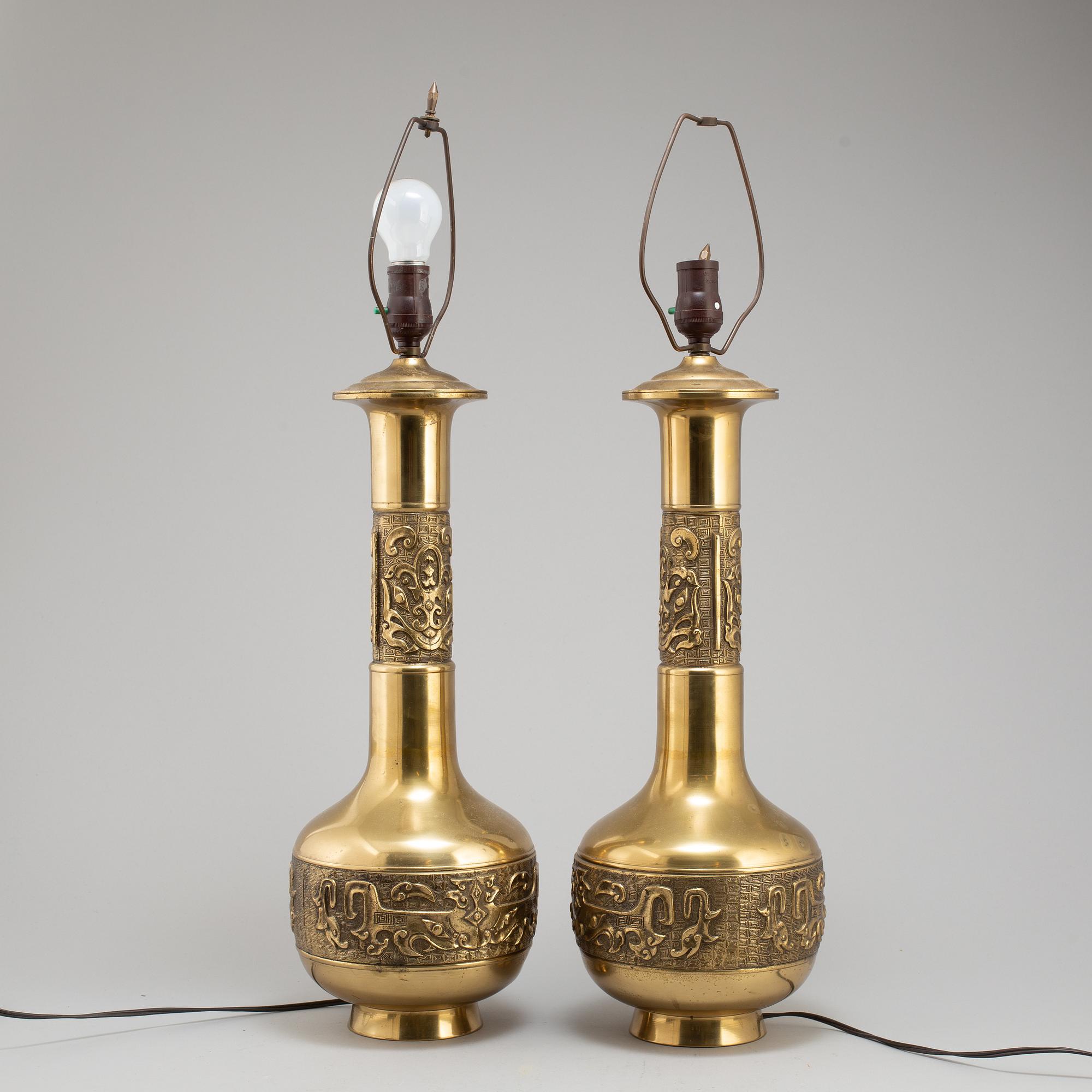 A pair of Chinese brass table lamps, 20th century.