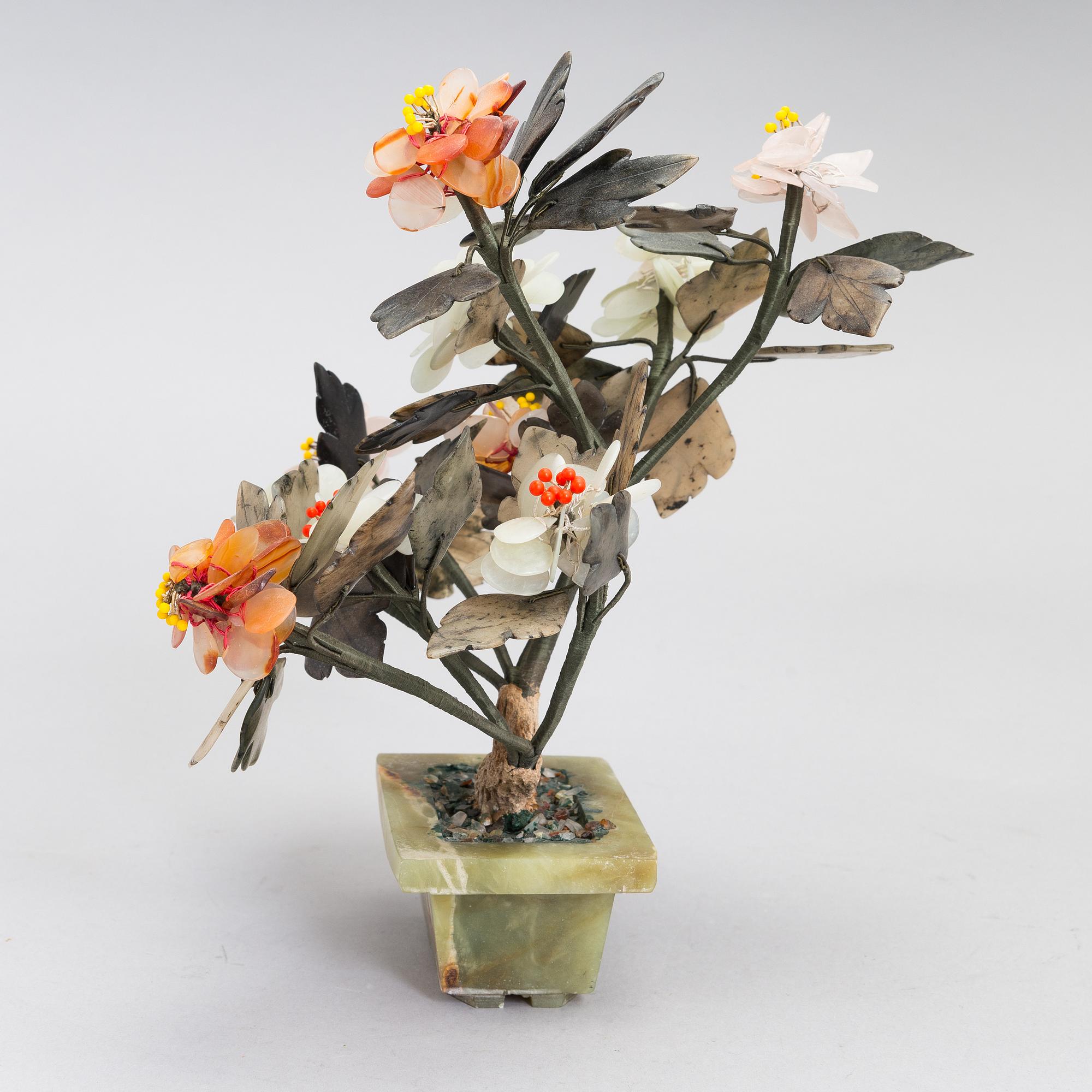 A Chinese table decoration in various stones, latter half of the 20th century.