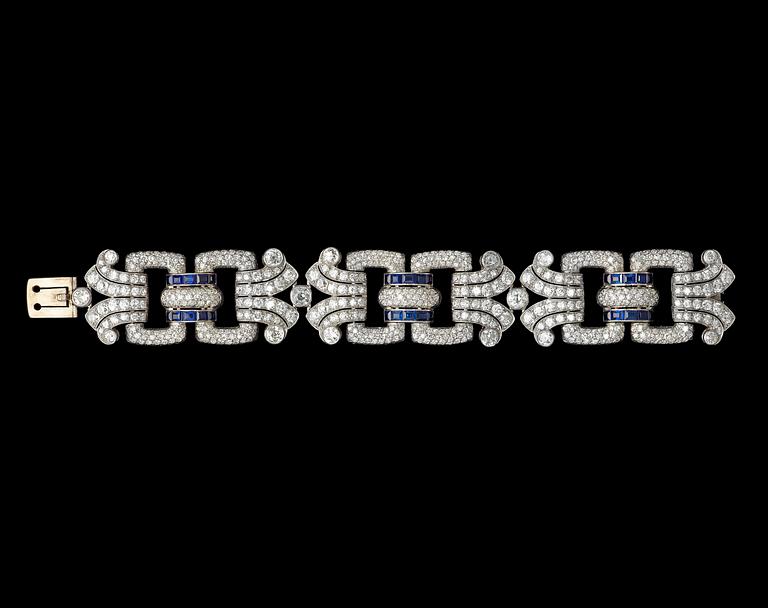 An Art Deco old cut diamond and blue sapphire bracelet, tot. app 30 and 5 cts, 1930's.