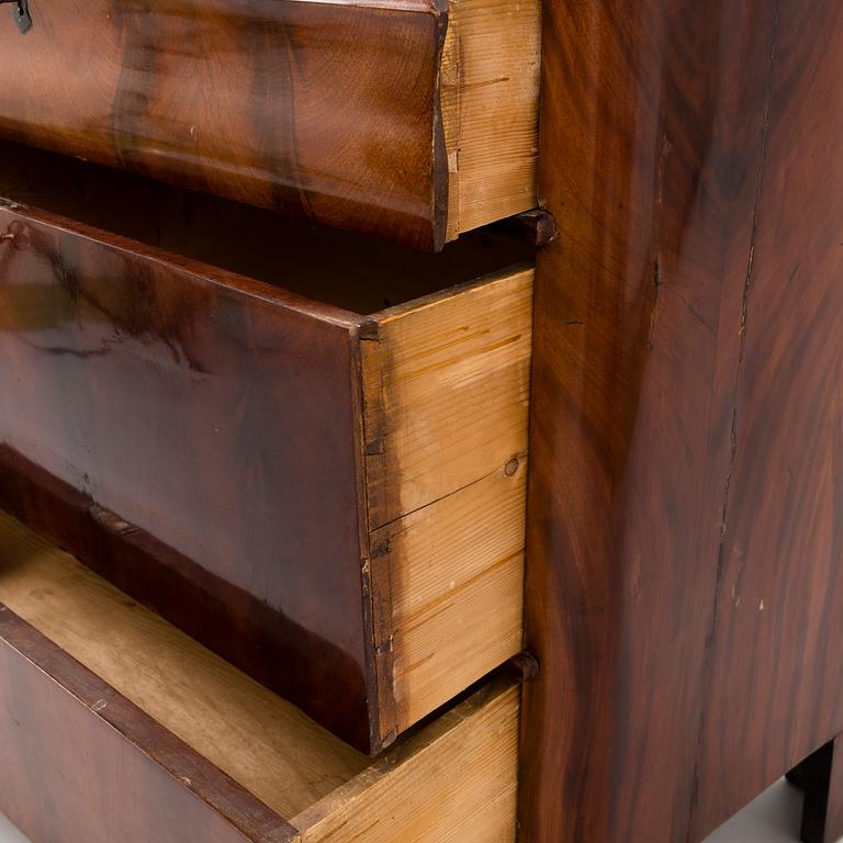 A Russian latter half of the 19th century chest of drawers in mahogany.