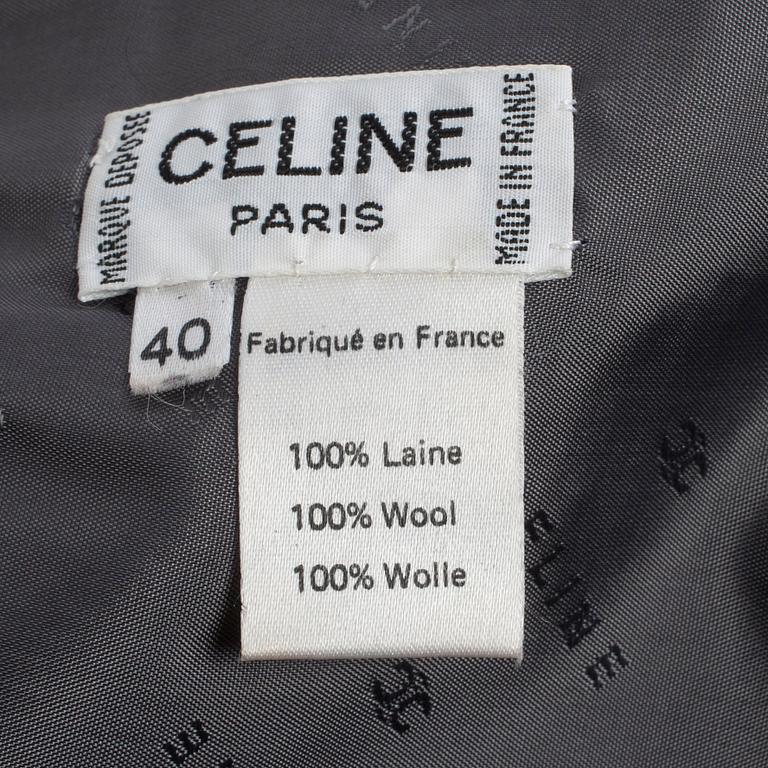 CÉLINE, a grey wool skirt.