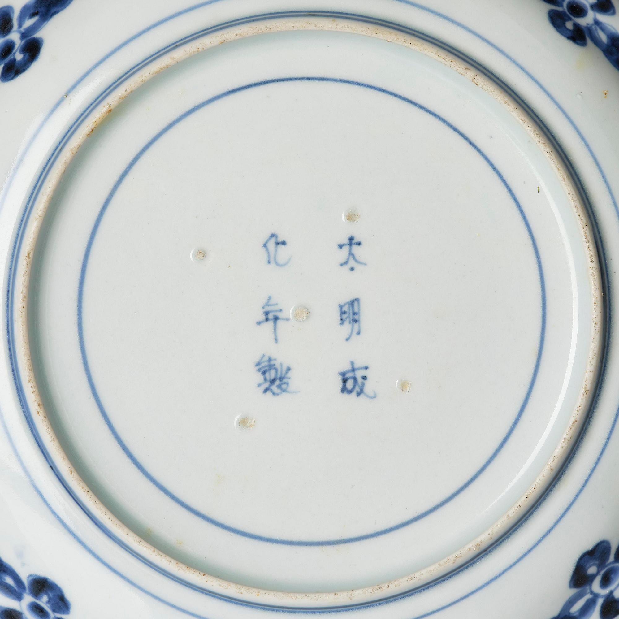 A group of eight blue and white Japanese plates, Meiji period (1868-1912).