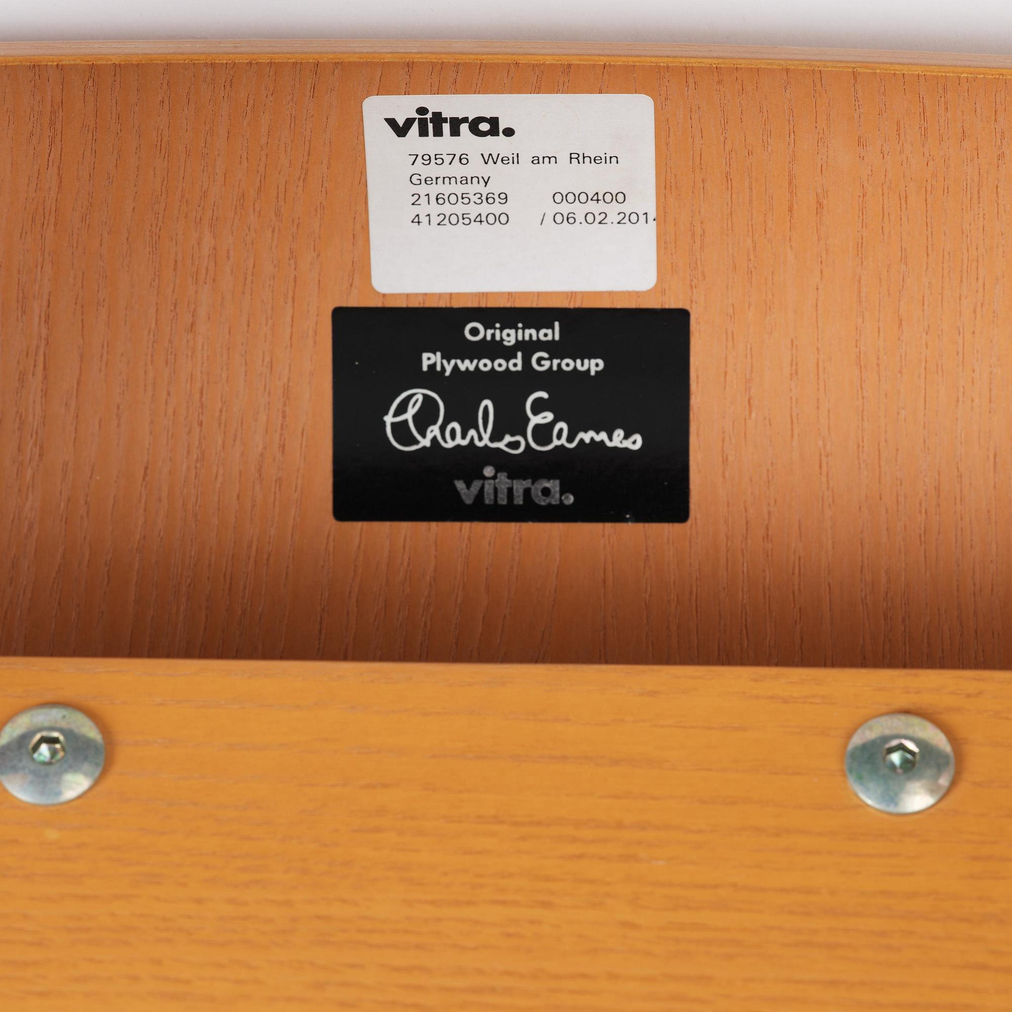 Charles & Ray Eames, a "Plywood Group LCW" easy chair, Vitra, 2015.