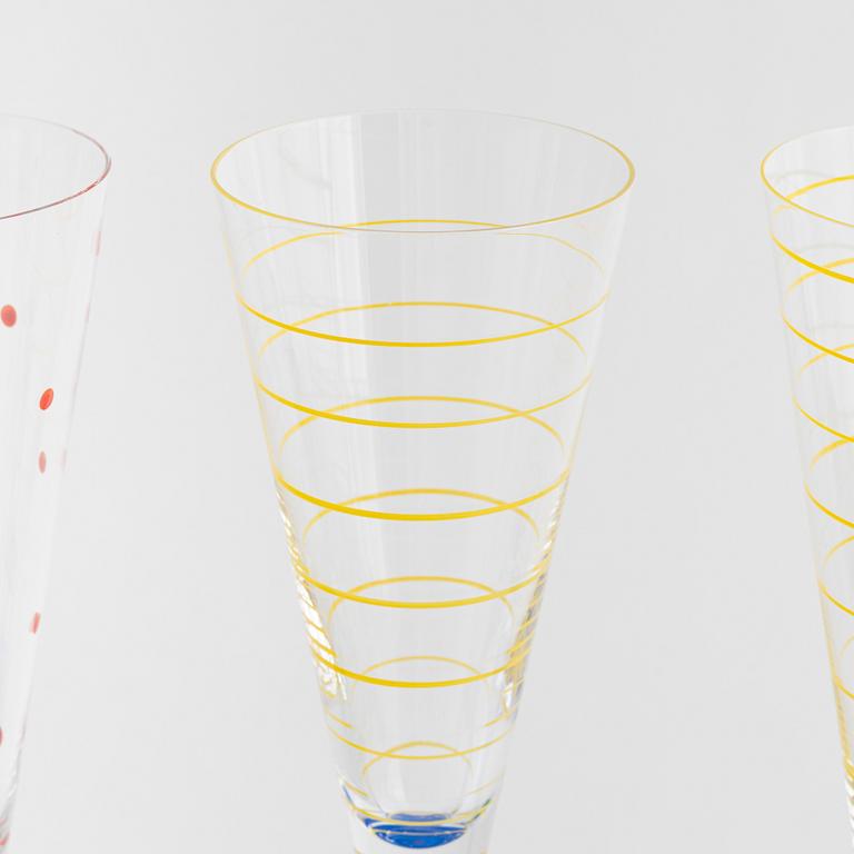 Anne Nilsson, four 'Clown' champagne glasses, Orrefors, Sweden.
