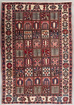 An old Bachtiari carpet ca 300 x 162 cm.