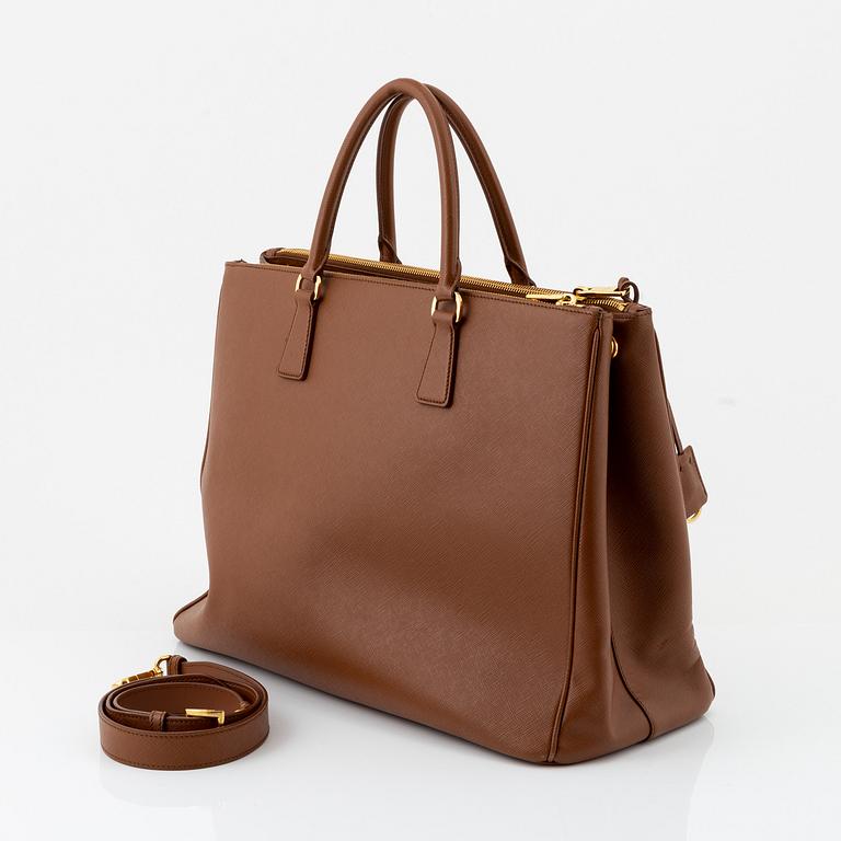 Prada, a brown Saffiano handbag.