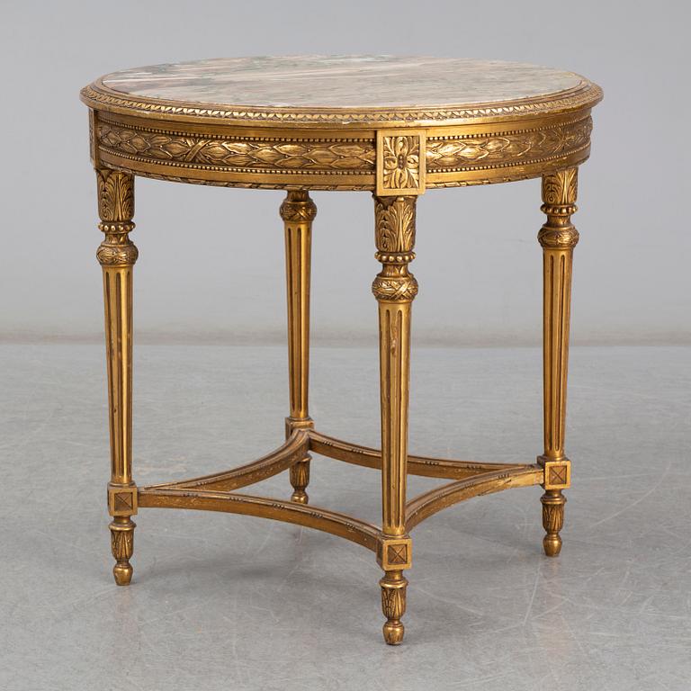 An early 20th century Louis XVI style table.