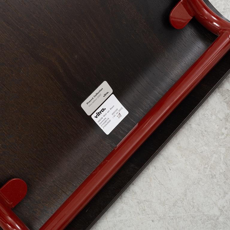 A Standard chair by Jean Prouvé for Vitra, dated 2002.