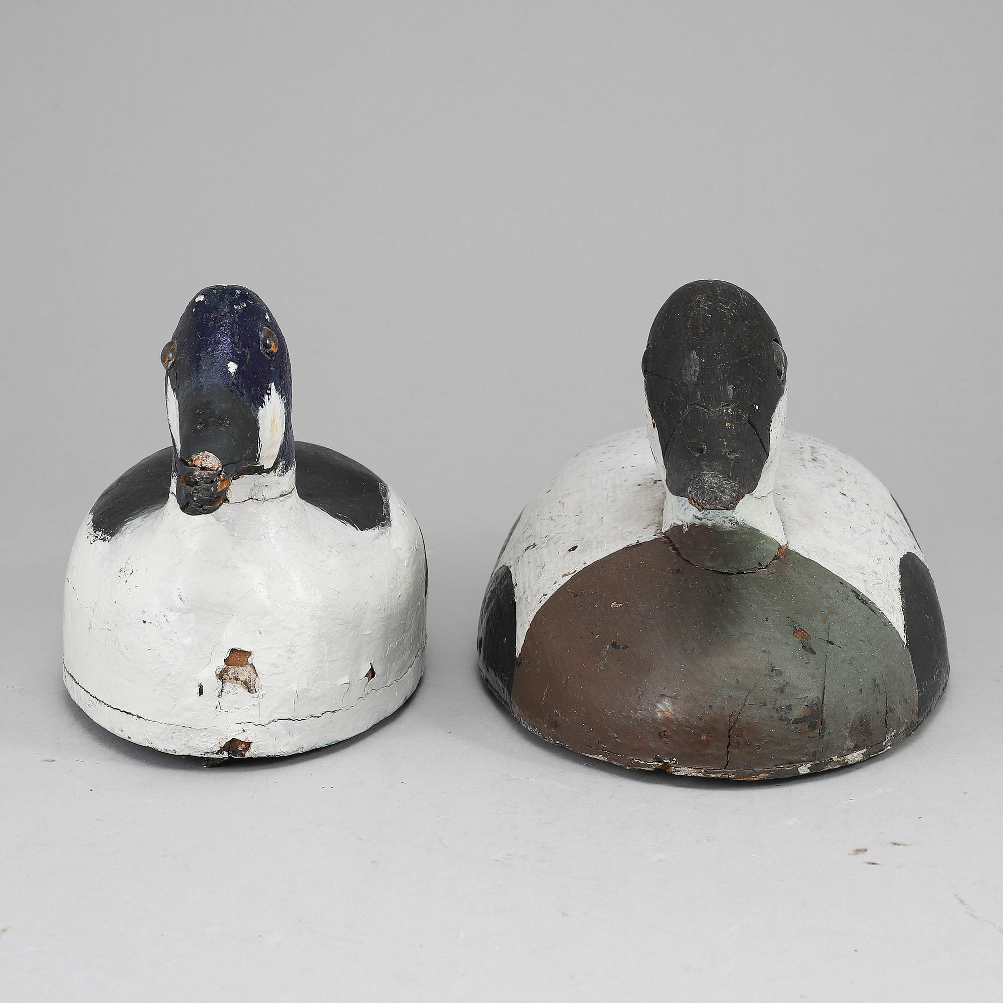 Two painted wood imitation duck,  first half of the 20th century.