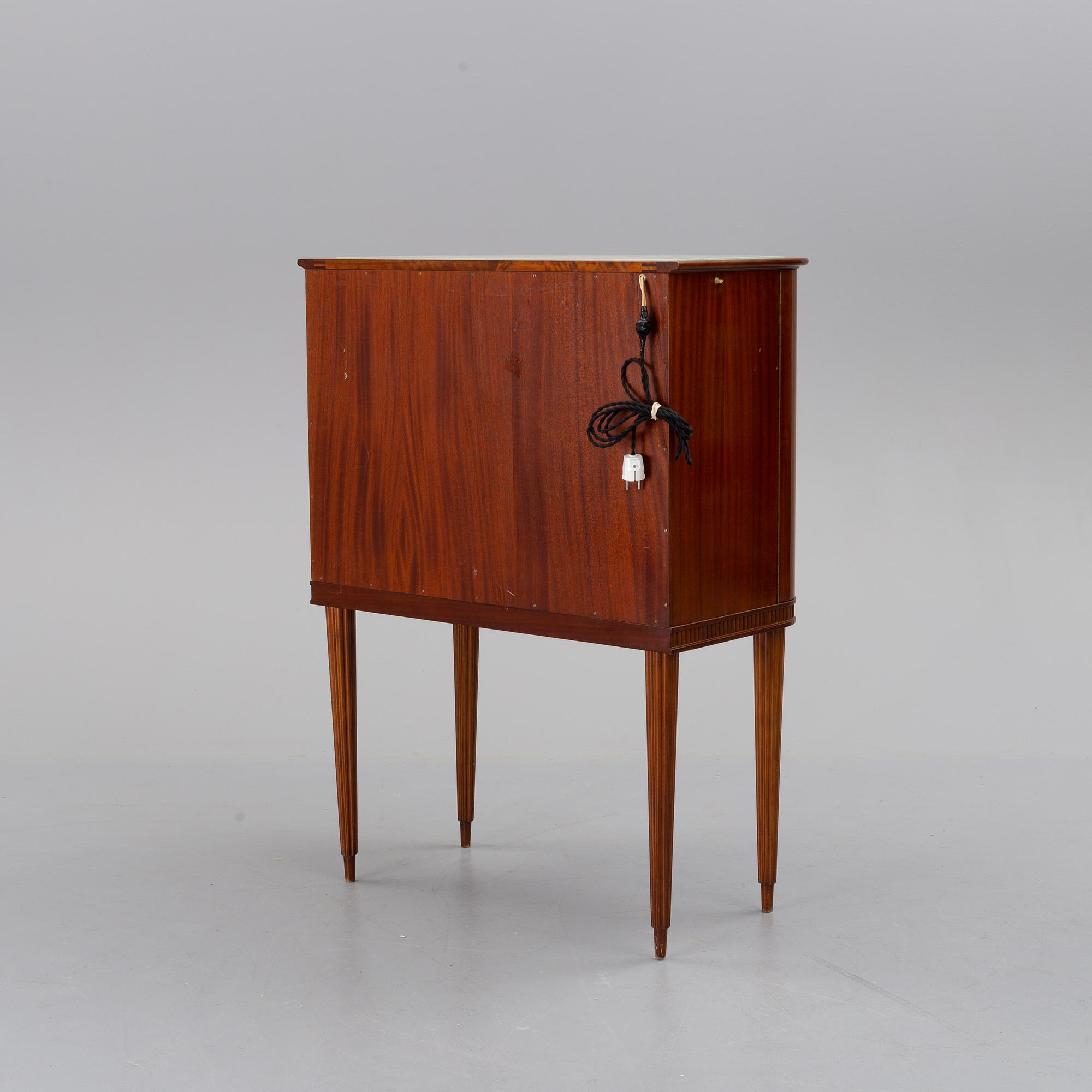 A mid 20th century drinking cabinet.