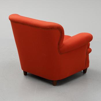 Josef Frank, a model 568 easy chair by Svenskt Tenn, Sweden.