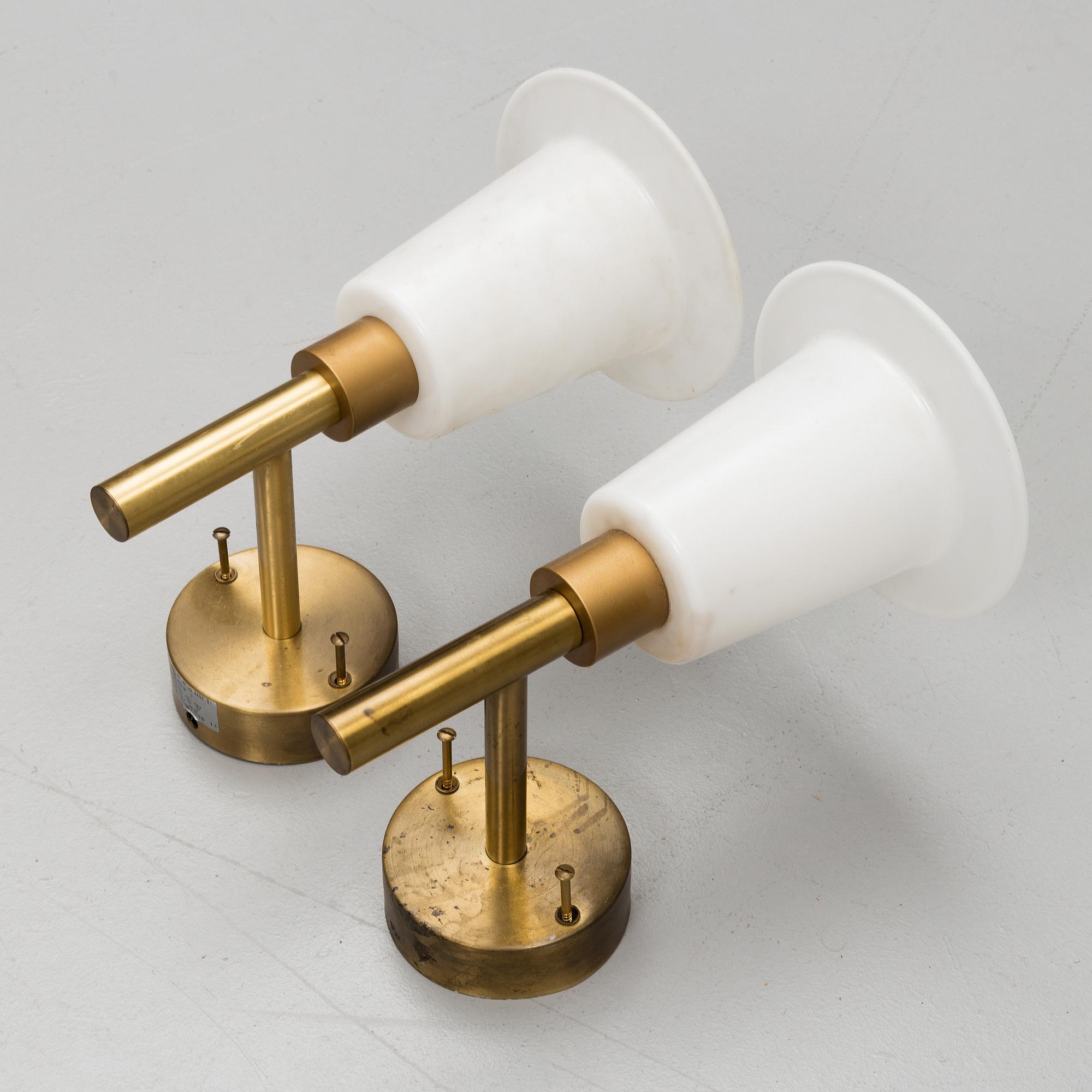UNO & ÖSTEN KRISTIANSSON, a pair of brass wall light from Luxus.