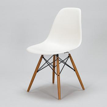 A 'Plastic chair DSW' by Charles and Ray Eames for Vitra.