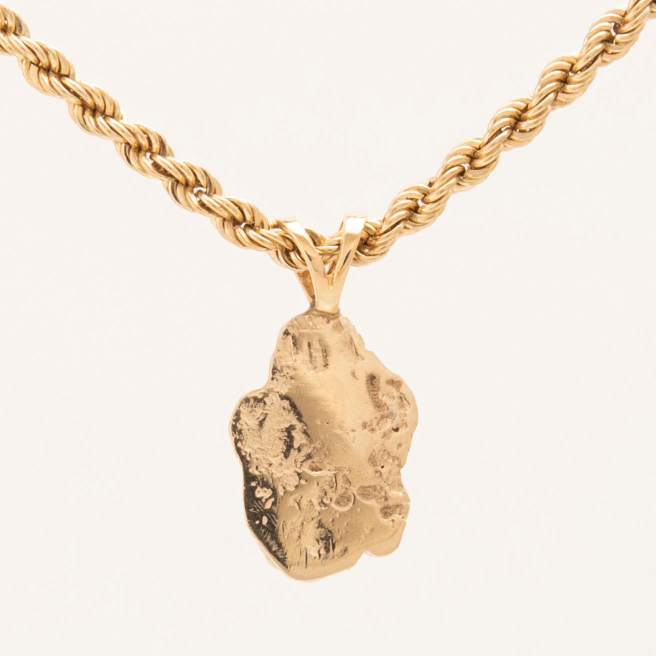 Halsband 14K guld med hänge i form av en guldklimp (nugget).