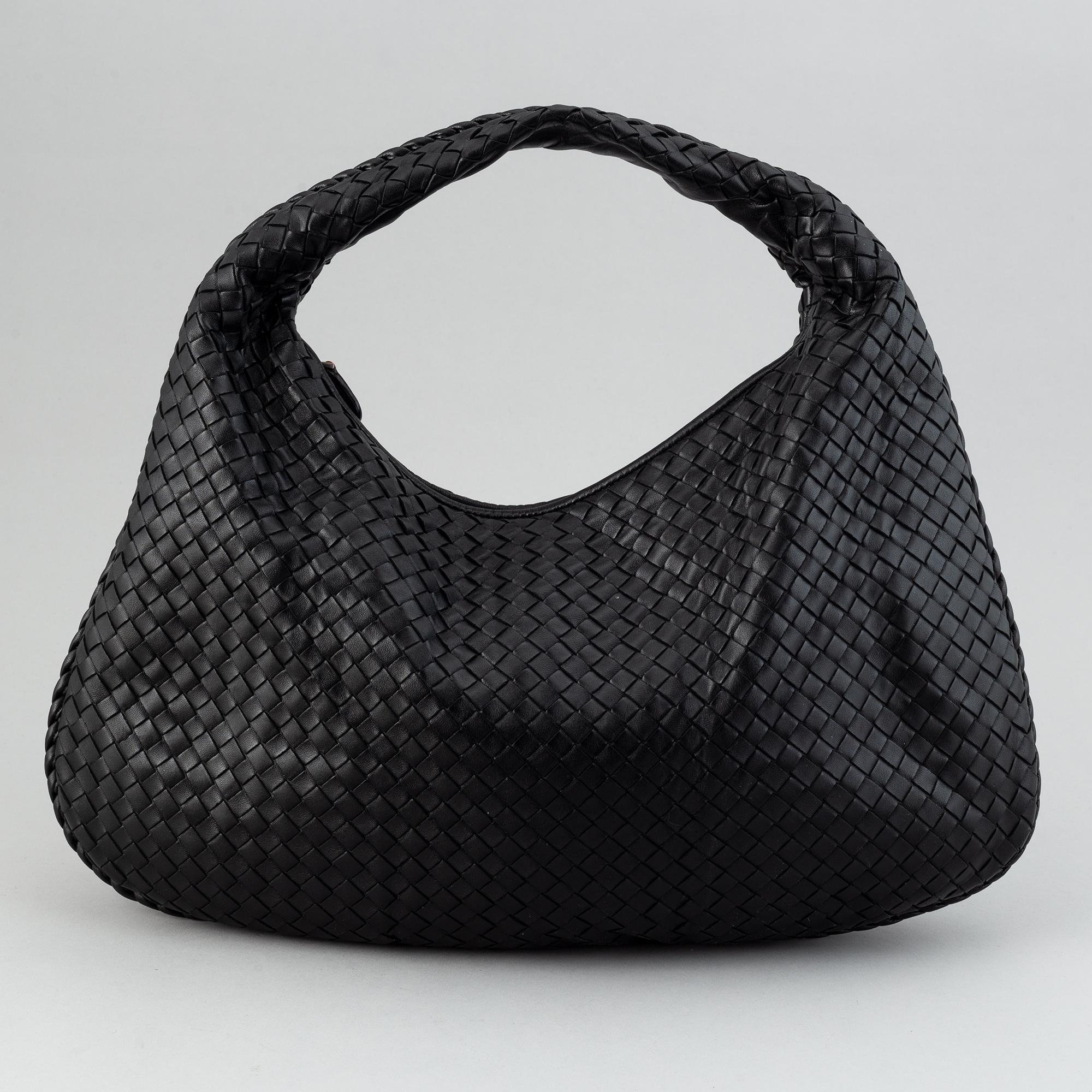 Bottega Veneta, black leather bag.