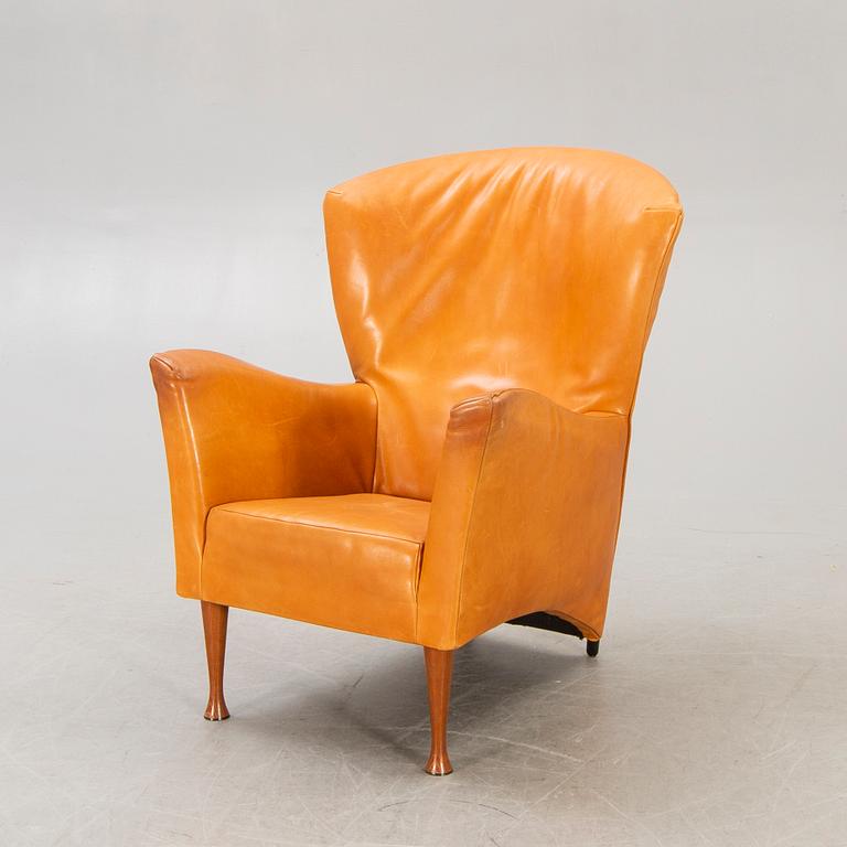 Gijs Papavoine, a Castor leather and wood armchair for Montis Netherlands later part of the 20th century.