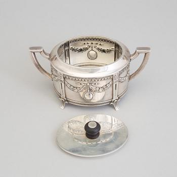 A set of three silver objects (coffeepot, creamer and sugarbowl, CG Hallberg and GAB, Stockholm 1907. Weight ca 1226 gr.