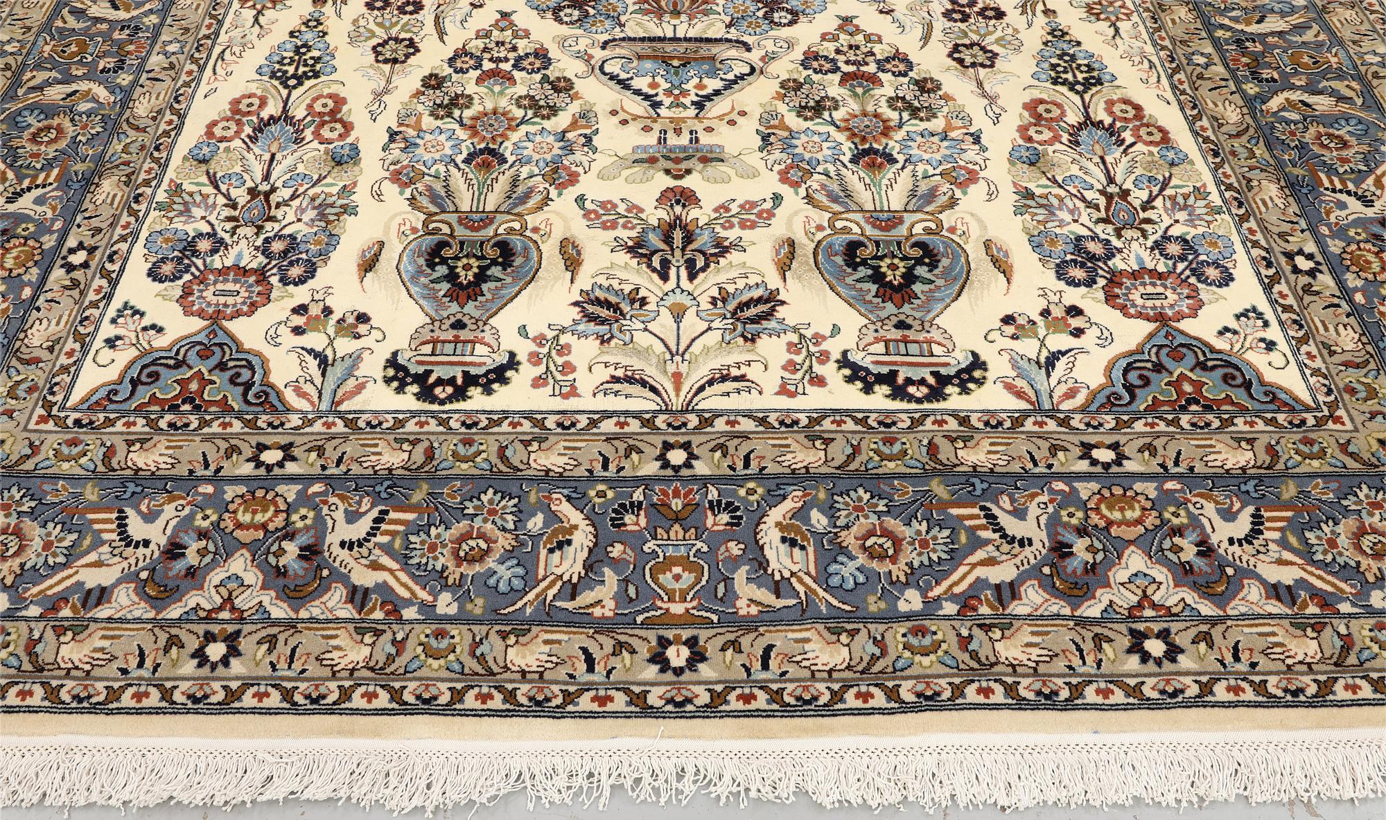 A Shareza carpet, signed, approx. 358 x 254 cm.
