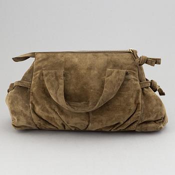 Gucci, a suede bag.
