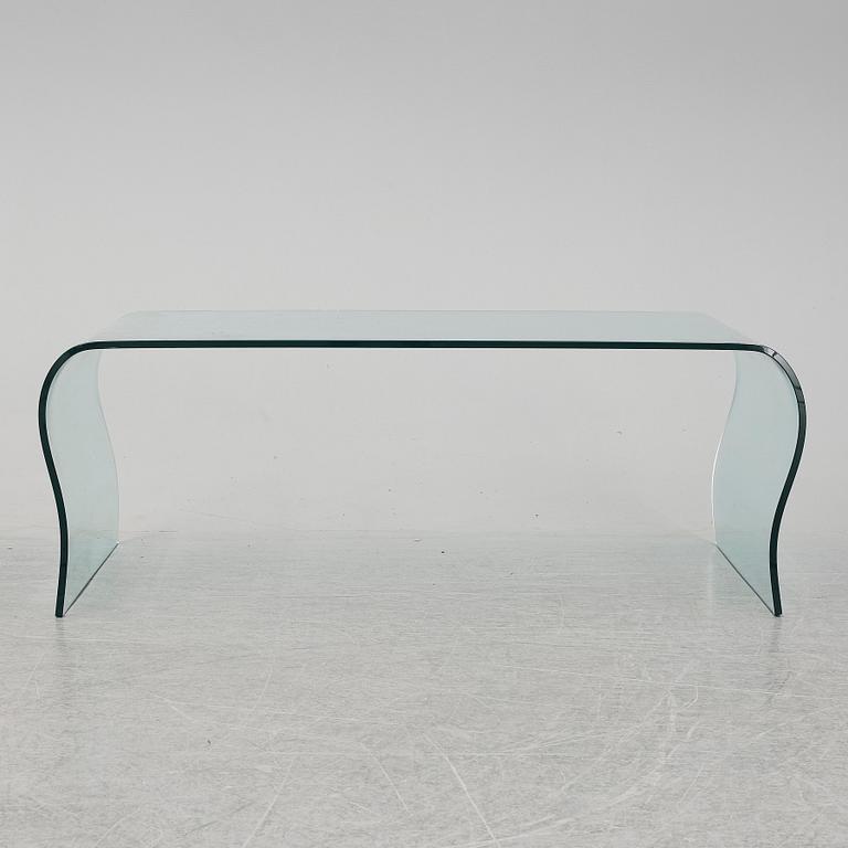 A mid 20th Century glass coffee table.