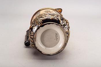 A Rörstrand majolica jug around 1900.