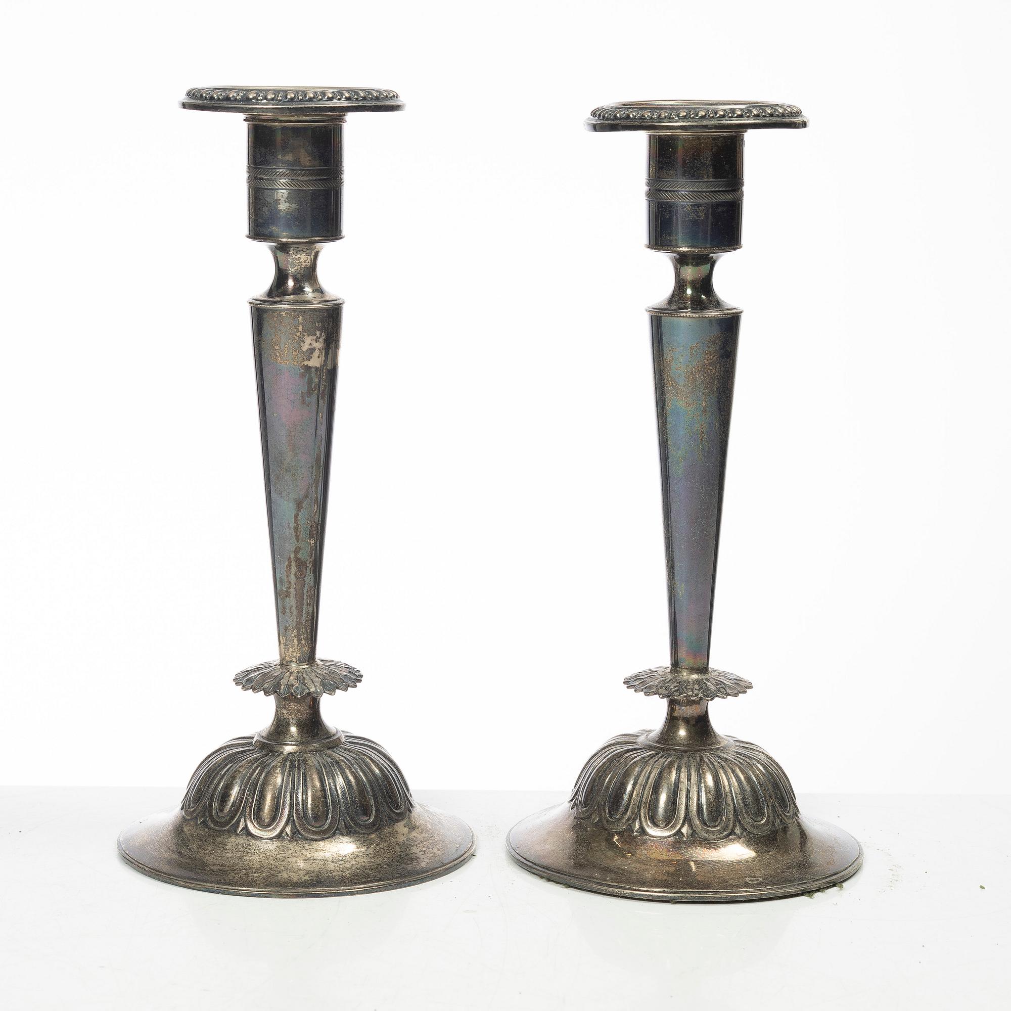 Four pairs och Swedish silver candlesticks, 19th-20th century.