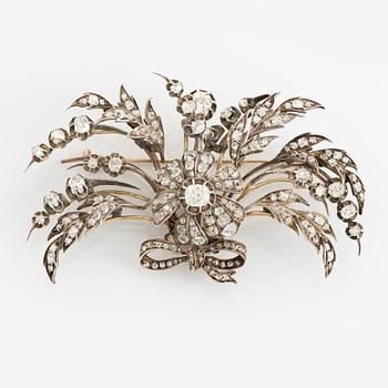 A brooch/tiara combination.